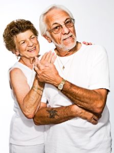 smiling elderly couple